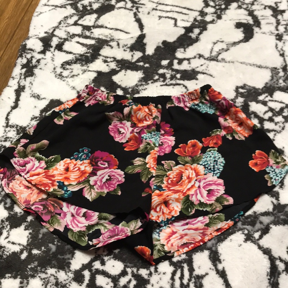 Floral shorts.